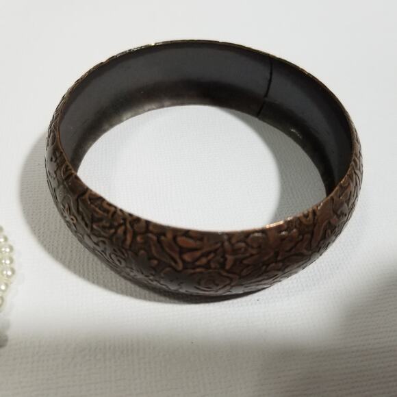 Two bracelets one copper colored bangle one multi chain faux - Picture 13 of 13